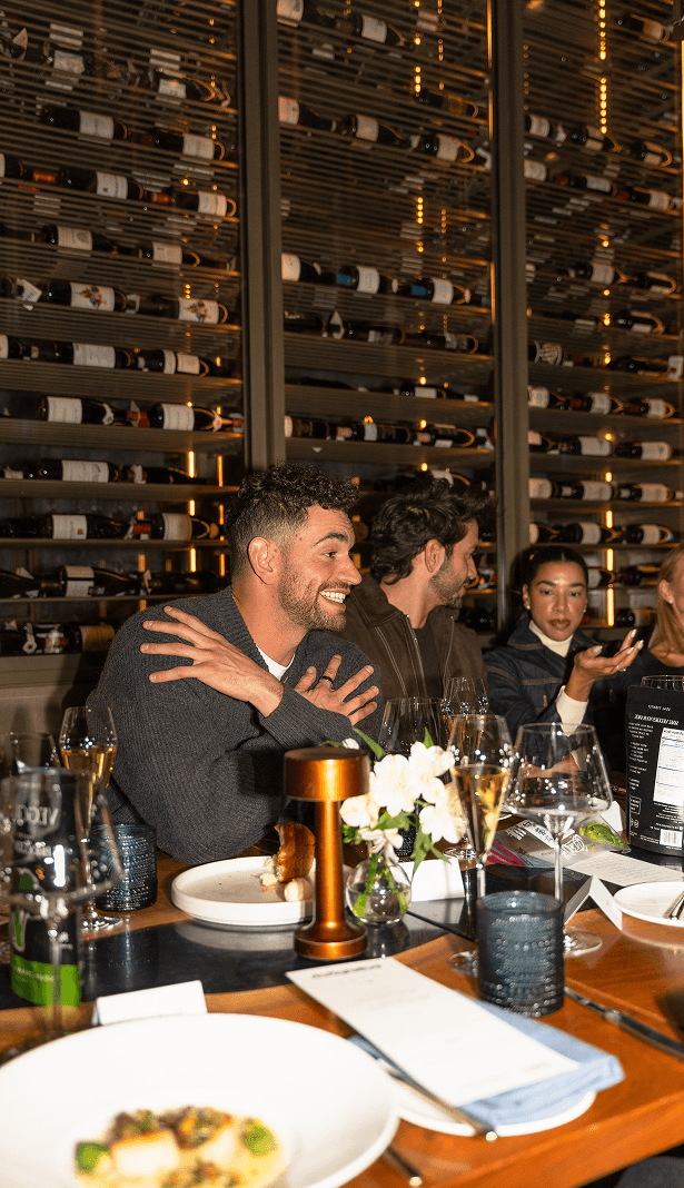 Guests connecting over dinner