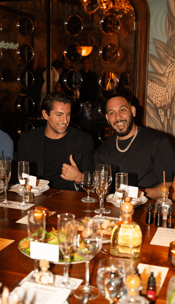 Guests sharing a moment at dinner